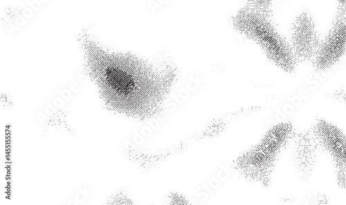 A textured dark gray shape expands outwards against a bright white background.