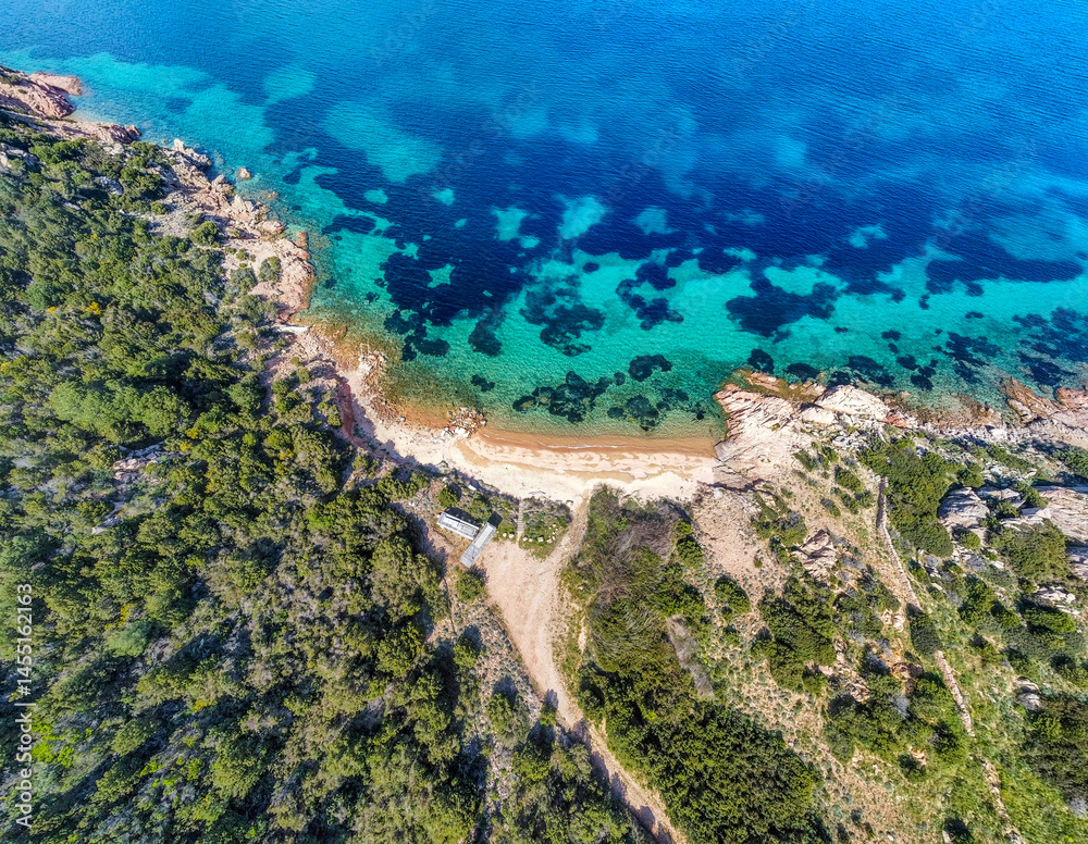 Aerial view of Capo Coda Cavallo shoreline in springtime
