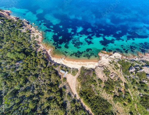 Obraz na płótnie Aerial view of Capo Coda Cavallo shoreline in springtime w salonie