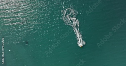 Sea waves created by a jet ski at Baltic Sea.