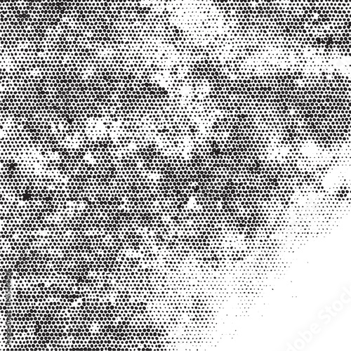 A textured grayscale of numerous overlapping dots creates a dynamic and visually engaging surface.