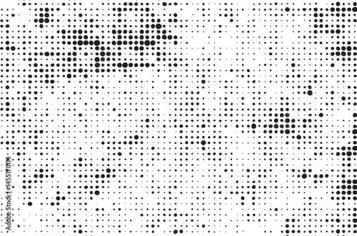 A dense array of interconnected black and white dots forms a textured surface.