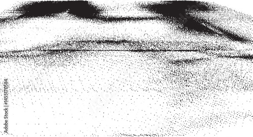 A textured grayscale fabric drapes across a horizontal surface.