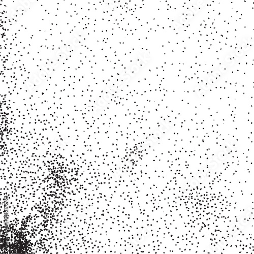 A dense scattering of small dark dots covers a predominantly white background.