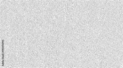 A wide textured white fabric stretches across a dark background.