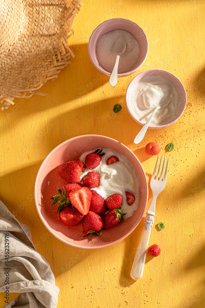Tasty and creamy strawberries as summer fresh dessert.