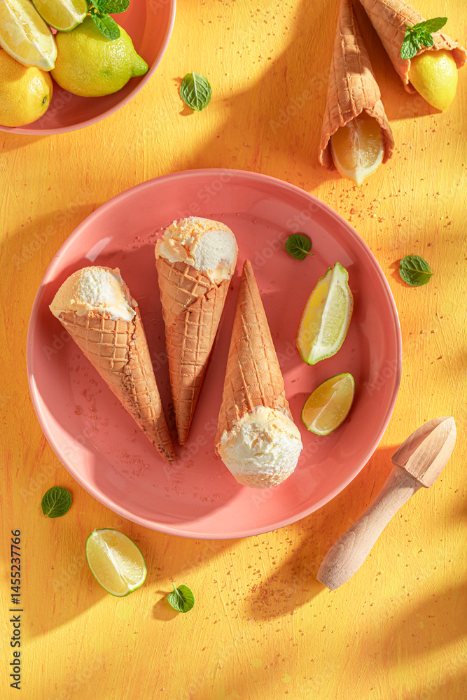 Delicious and homemade lemon ice cream as a summer dessert.