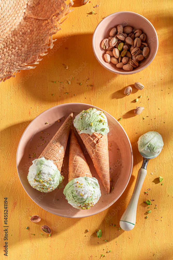 Homemade and delicious pistachio ice cream as a summer dessert.