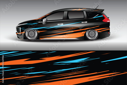 Stylish black car with vibrant decals on display