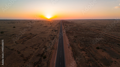 Sunset over the longest straight road