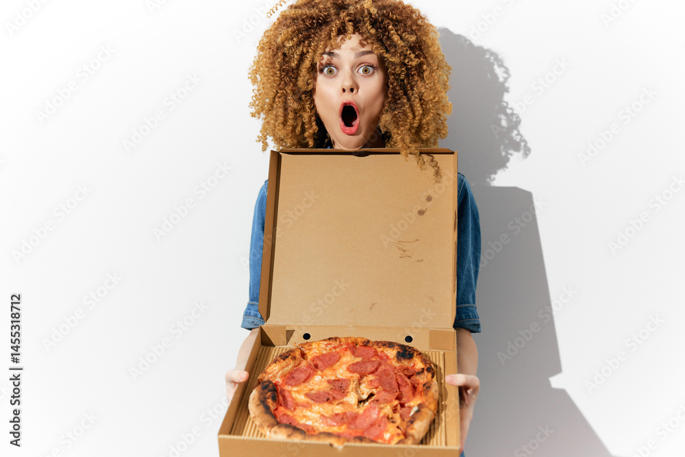 Excited woman with curly hair holding a pizza box, expressing joy and surprise with a vibrant background showcasing her love for pizza