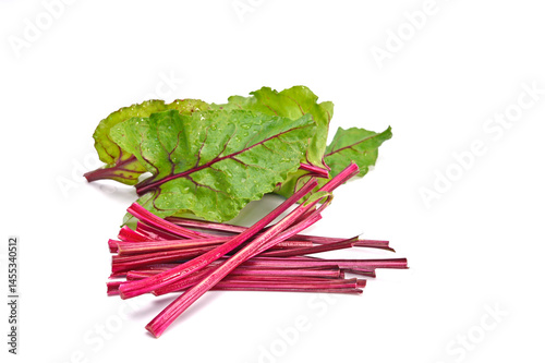 Organic beetroot with stem isolated on white background.