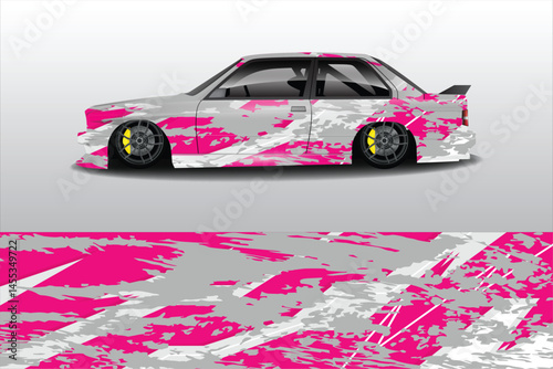 Stylish modified car with vibrant wrap design displayed