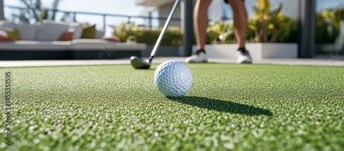 Rooftop Golf Person chipping on artificial turf, modern city view
