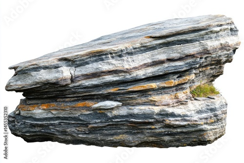 Large, layered rock, exhibiting  striking strata, and various colors
