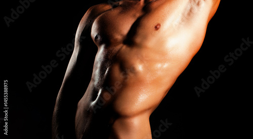 Obraz na płótnie Male muscular body. Male naked torso. Strong man with muscular body. Male bare torso. Shirtless athletic hot guy with muscular abs. Mans powerful. Muscular sexy man showing six pack abs. w salonie