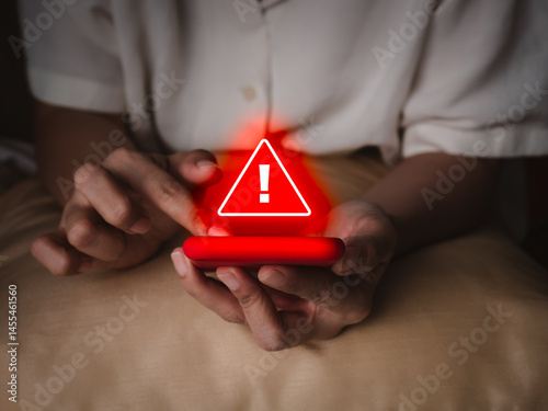 Wallpaper Mural Hacker attack detection alert, sms fraud and scammer calls, fraudulent phone calls concept. Red triangle warning caution alert show on smart mobile phone in senior elderly hands, in the dark room. Torontodigital.ca