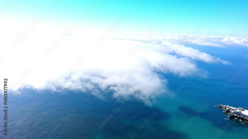 Aerial View of Rocky Coastline with Turquoise Water on Sunny Day Aerial View of Rocky Coastline with Turquoise Water on Sunny Day