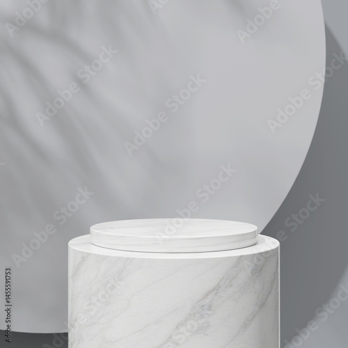 Three white marble columns set against a muted gray background, highlighting geometric elegance.