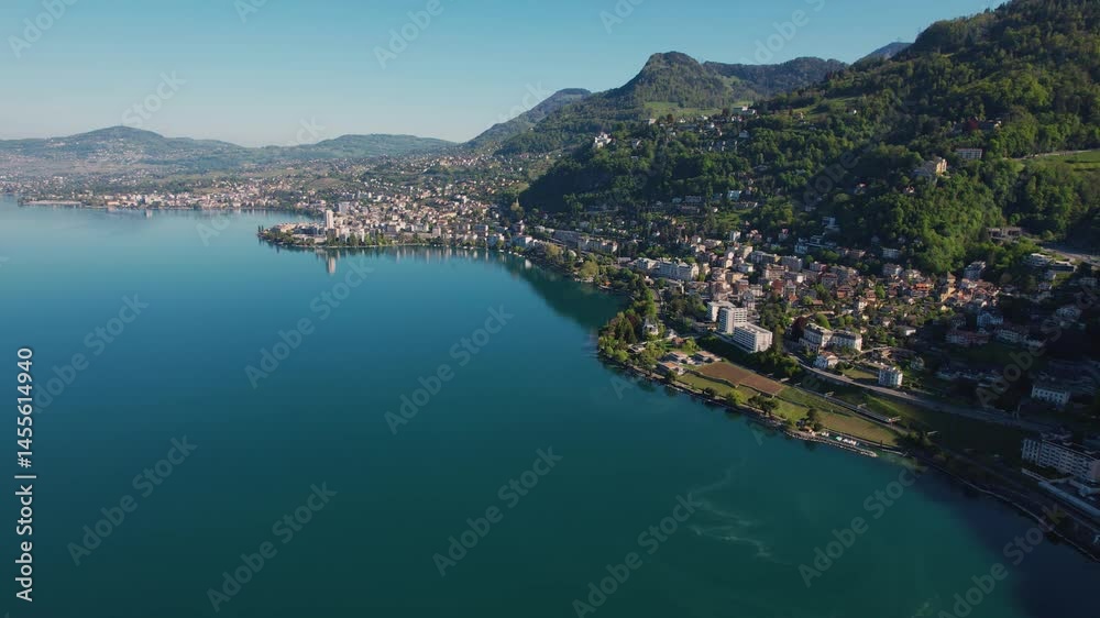 Panoramic aerial of the old town of the city Montreux in Switzerland on a sunny noon in summer beside lake geneva Panoramic aerial of the old town of the city Montreux in Switzerland on a sunny noon in summer beside lake geneva