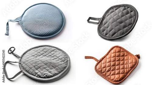 Four quilted oven mitts in various colors