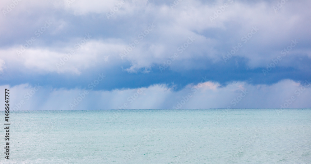 Fototapeta premium A stormy sky with a large cloud in the middle