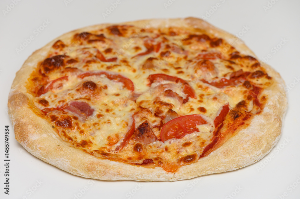 Rustic-style pizza topped with cheese, bacon, and tomato slices, fresh from the oven. Great for culinary websites and menus. Rustic-style pizza topped with cheese, bacon, and tomato slices, fresh from the oven. Great for culinary websites and menus.