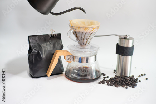 Obraz na płótnie Coffee drip equipment with coffee bean on white background w salonie