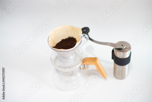 Obraz na płótnie Coffee drip equipment with coffee bean on white background w salonie