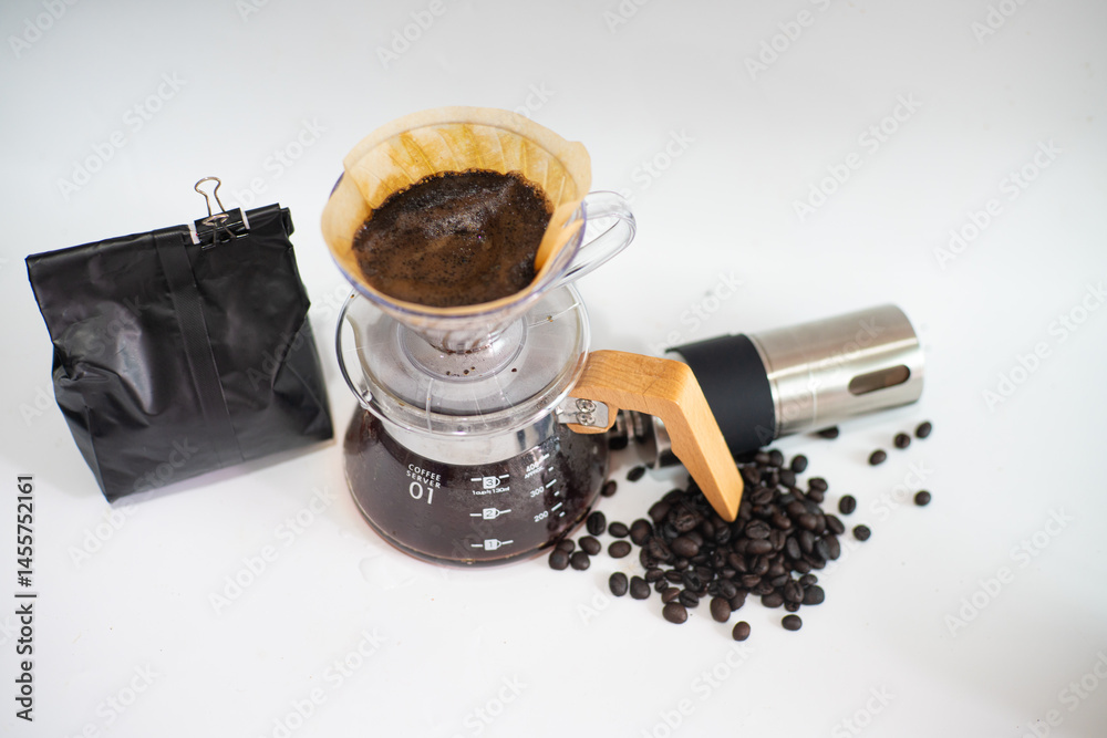 Coffee drip equipment with coffee bean on white background