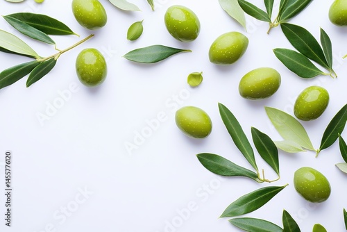 Fresh green olives with lush leaves on white background natural food photography life plant image