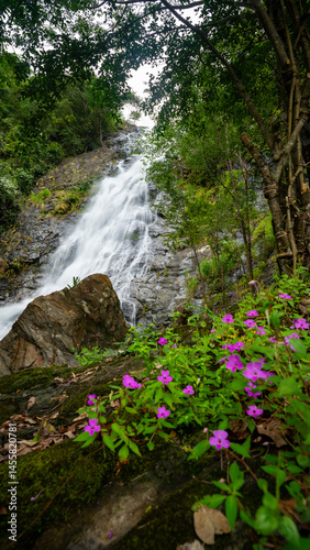 Sarika waterfall with rocks in the foreground beautiful waterfall in Nakhon nayok Thailand photo