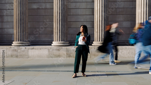 woman, business, businesswoman, smartphone, rush, street, walking, blurred, motion, building, architecture, columns