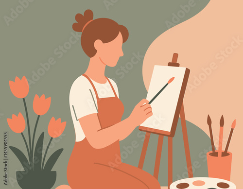 artist at work painting flowers with vibrant colors