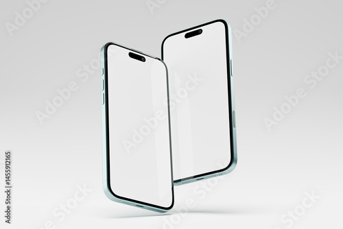 Two modern frameless phones stand on white