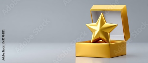 Obraz na płótnie A shiny gold star trophy displayed in an open golden box on a reflective surface against a gray background. w salonie