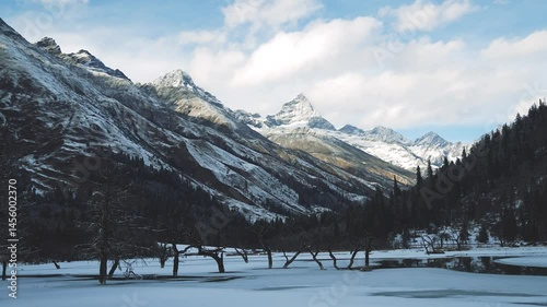 Siguniang Mountain (Siguniangshan or Four Girls Mountain)and frozen lake on January, known as the “Sacred Mountain of the East”, is located in Shuangqiao Village, China 