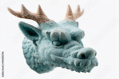 Enigmatic azure wool dragon bust with felt antlers, evoking Winter Solstice whimsy and mythic fantasy crafting traditions