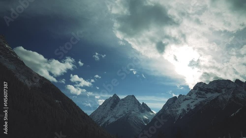 Timelapse Scenery in Siguniang National Park, a natural tourist attraction in China, Sichuan Province, snow-covered mountains in January