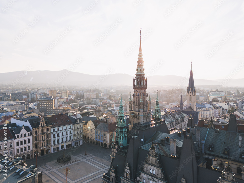 Skyline cityscape of Liberec, Czech Republic. Panoramic aerial view of the old town (staré město): main square and city hall at sunset