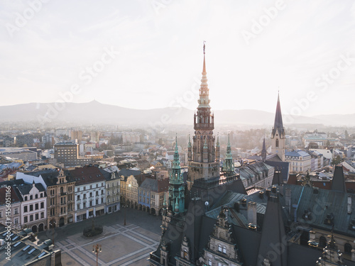 Skyline cityscape of Liberec, Czech Republic. Panoramic aerial view of the old town (staré město): main square and city hall at sunset