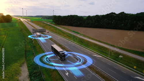 Autonomous driverless trucks with trailers, without a driver, remote control artificial intelligence transport cargo on highway. Smart transportation concept of the future, automated transportation.
