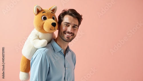 Shoulder Plush. Cuddly male comfort. Male man model isolated background. Man finds solace and comfort in cuddly plush kangaroo, symbolizing affection and gentle masculinity indoors.