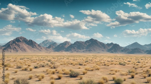Obraz na płótnie Desert mountain range under a partly cloudy sky. Background shows sparse desert vegetation. Ideal for travel brochures w salonie