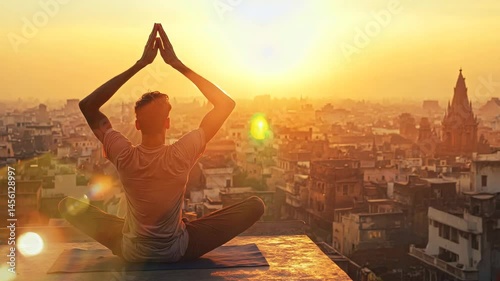 A man is sitting on a yoga mat in the city, looking up at the sun. Concept of peace and tranquility, as the man practices yoga in the midst of a bustling urban environment
