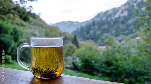 Wallpaper Mural 16 Hot Greek mountain tea tsai tou vounou herbs in clear glass mug captured in cozy normal view with wooden kitchen background traditional drink from Greece Torontodigital.ca