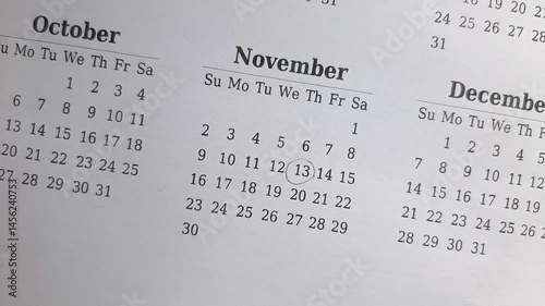 marking 13 November date on the calendar	
