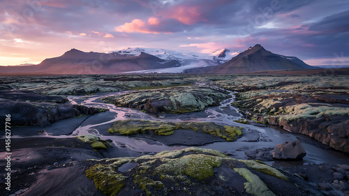 Mountainous landscape, flowing water, moss-covered rocks.
