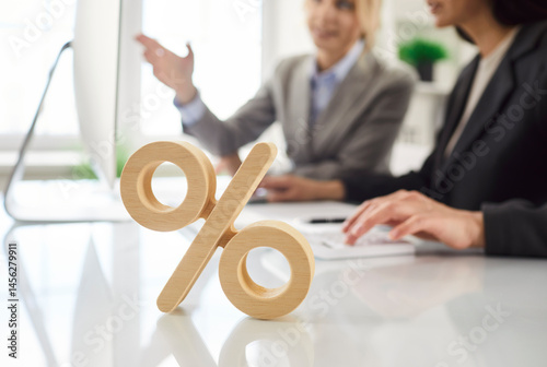 Obraz na plátně Per cent sign symbol on desk, calculate percentage, precise financial results, f