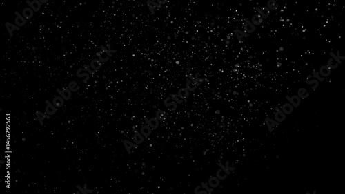 Air particles in soft golden ambient atmosphere